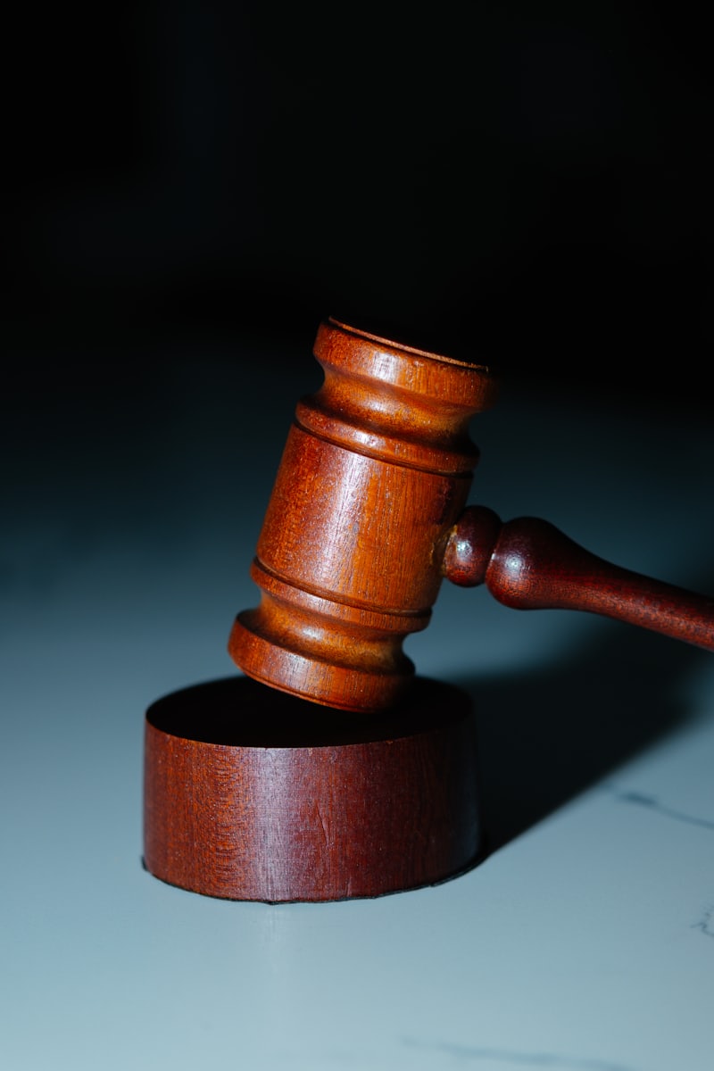 A wooden judge's hammer on a table